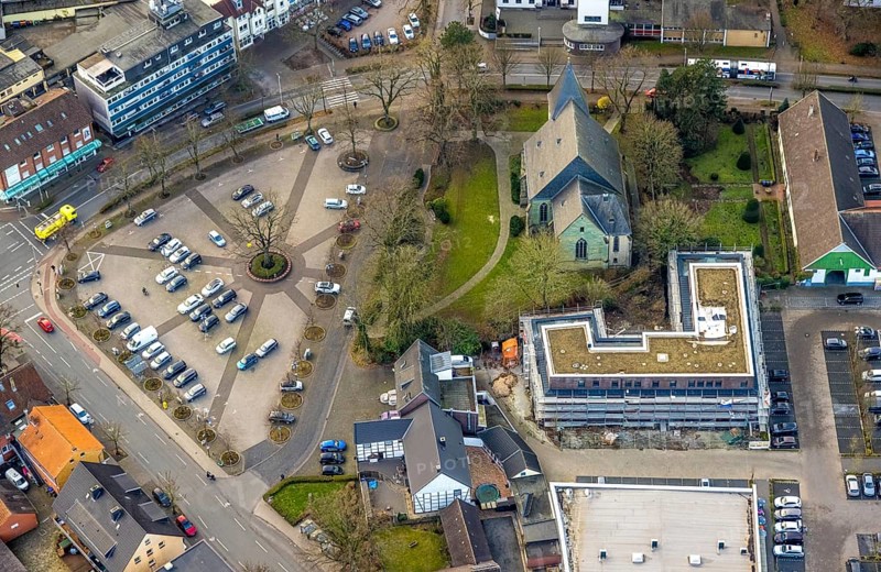 Aerial view, Protestant St. Victor's Church, construction site with new building and car park Herringer Markt, Herringer Heide, Herringen district, Hamm, Ruhr area, North Rhine-Westphalia, Germany