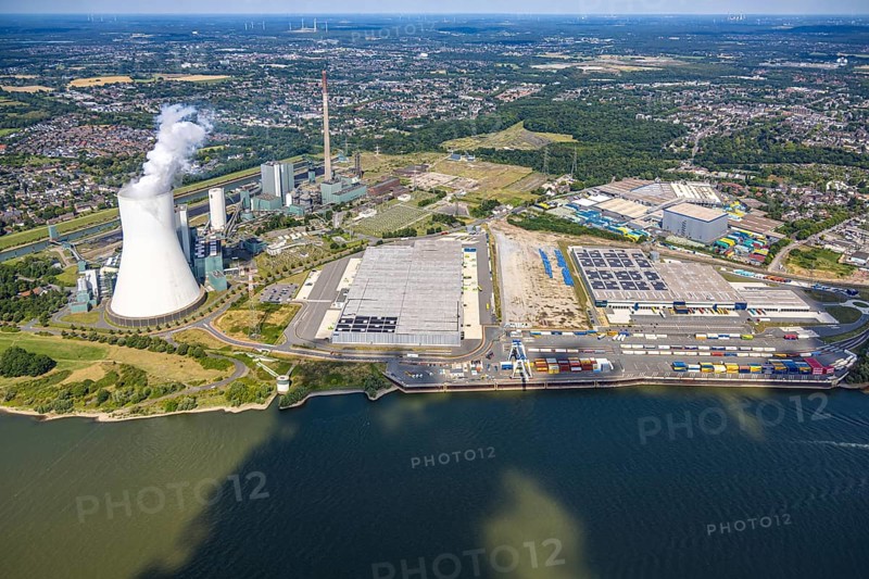Aerial view, logport VI (six) Walsum, industrial estate and construction site with new building at the STEAG Walsum power station on the Rhine, steaming cooling tower, Alt-Walsum, Duisburg, Ruhr area, North Rhine-Westphalia, Germany, construction work, construction area, construction site, building land, construction project, construction site, DE, Duisburg-Nord, Europe, commercial enterprises, commercial area, commercial area, commercial property, business park, commercial location, commercial use, large construction site, freight transport, combined heat and power plant, industrial area, industrial location, power plant, logistics, logistics service, logistics service provider, logistics provider, logistics centre, aerial view, aerial photography, aerial photography, new construction, transport service, overview, bird's eye view, birds-eyes view, logport 6 (Six), logport VI Walsum, multimodal logistics centre, overview