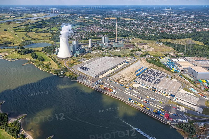 Aerial view, logport VI (six) Walsum, industrial estate and construction site with new building at the STEAG Walsum power station on the Rhine, steaming cooling tower, Alt-Walsum, Duisburg, Ruhr area, North Rhine-Westphalia, Germany, construction work, construction area, construction site, building land, construction project, construction site, DE, Duisburg-Nord, Europe, commercial enterprises, commercial area, commercial area, commercial property, business park, commercial location, commercial use, large construction site, freight transport, combined heat and power plant, industrial area, industrial location, power plant, logistics, logistics service, logistics service provider, logistics provider, logistics centre, aerial view, aerial photography, aerial photography, new construction, transport service, overview, bird's eye view, birds-eyes view, logport 6 (Six), logport VI Walsum, multimodal logistics centre, overview
