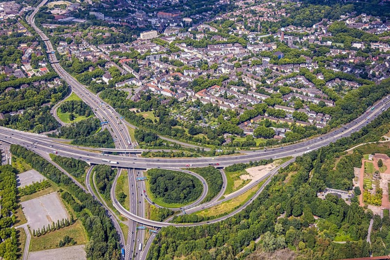 Aerial view, motorway junction Duisburg-Nord with motorway A42 and motorway A59, residential area Obermeiderich, Duisburg, Ruhr area, North Rhine-Westphalia, Germany, motorway, DE, Europe, aerial view, aerial photography, aerial photography, road traffic, overview, bird's-eye view, overview