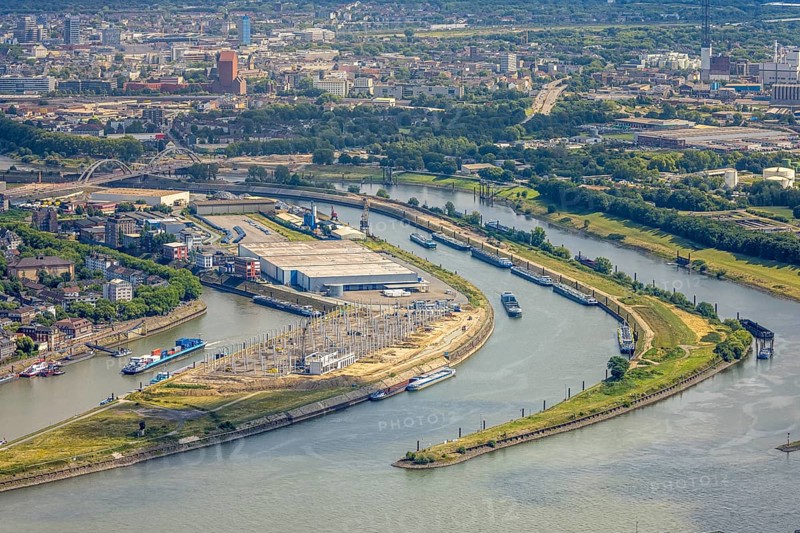 Aerial view, Mercatorinsel inland navigation on Vinckekanal and harbour canal, Stangenwald construction site with new logistics hall, Ruhrort, Duisburg, Ruhr area, North Rhine-Westphalia, Germany, construction work, construction area, building site, building plots, construction project, construction site, DE, Europe, harbour, aerial view, aerial photography, aerial photography, Mercator Island, new construction, overview, bird's-eye view, overview