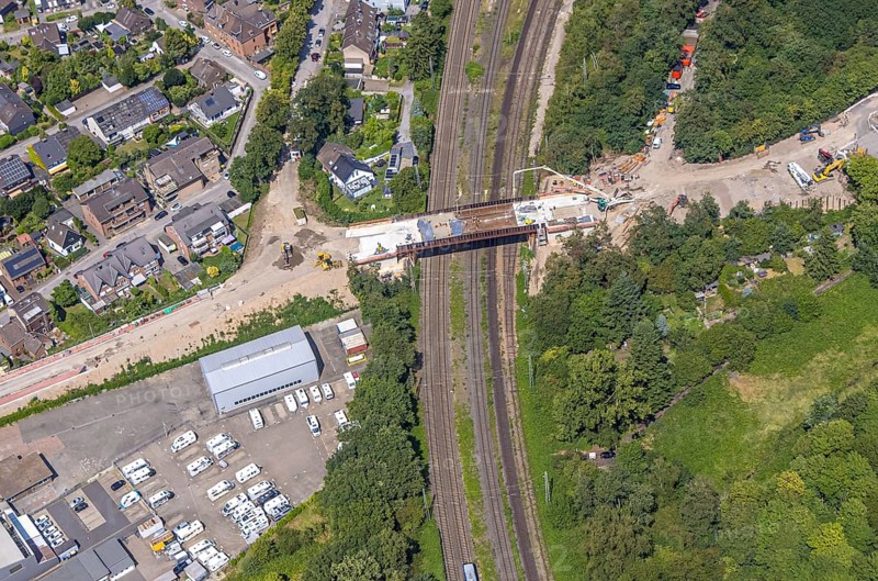 Aerial view, construction site with new bridge An der Cölve over railway tracks, Moers-Schwafheim, Mörs, Ruhr area, North Rhine-Westphalia, Germany, construction work, construction area, building site, building plots, construction project, construction site, bridge, DE, Duisburg, Europe, aerial view, aerial photography, aerial photography, new building, overview, bird's-eye view, bird's-eye view, overview