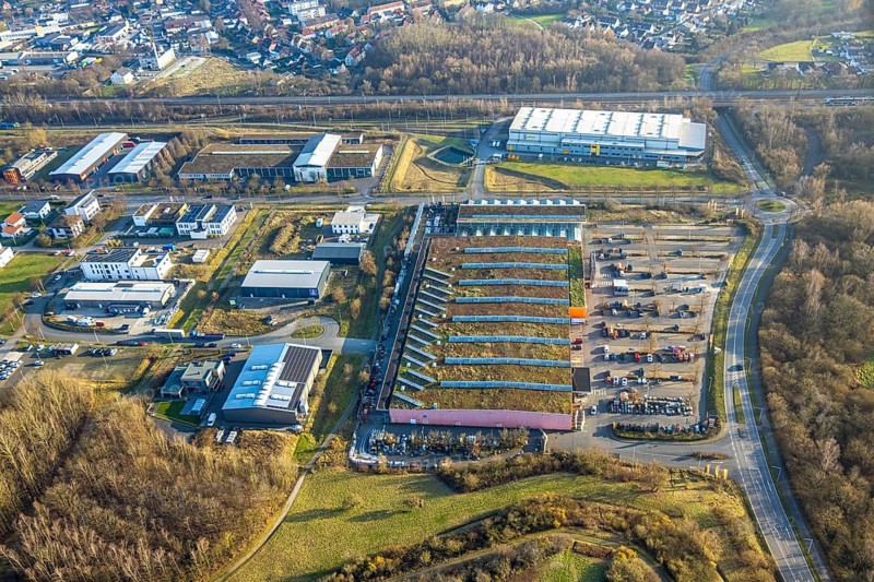 Aerial view, OBI Markt Hamm Bauamrkt with green roof, behind eurobahn GmbH & Co. KG - Hamm-Heessen workshop, A.H.G. Handelsgesellschaft für Haushaltswaren GmbH, Heessen district, Hamm, Ruhr area, North Rhine-Westphalia, Germany