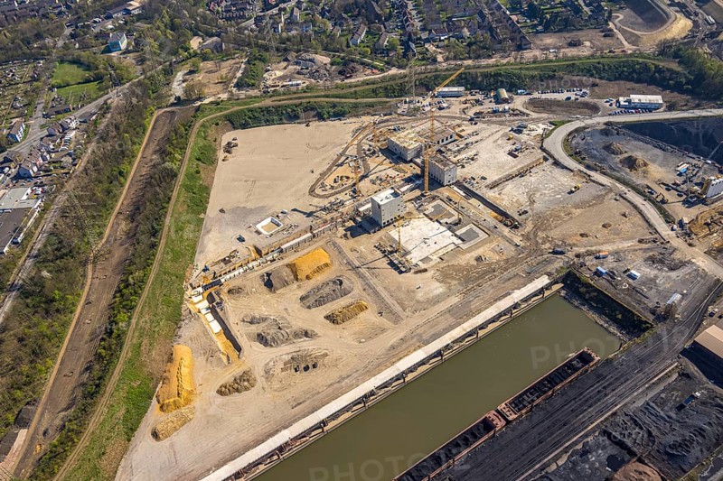 Aerial view, construction area with building site at the southern harbour, direct reduction plant planned by Thyssenkrupp, Fahrn, Duisburg, Ruhr area, North Rhine-Westphalia, Germany
