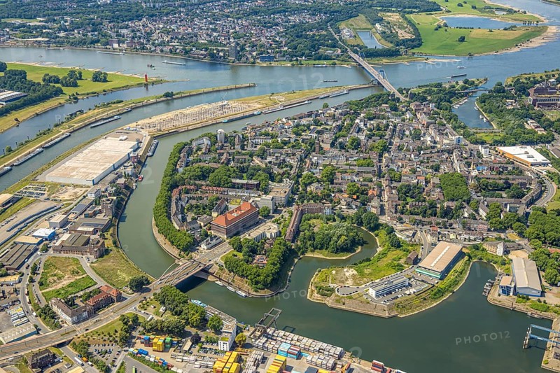 Aerial view, district Ruhrort at Duisburg harbour, river Rhine and Friedrich-Ebert-Bridge, below the Karl-Lehr-Bridge, Mercatorinsel Stangenwald construction site with new logistics hall, river Ruhr estuary, Ruhrort, Duisburg, Ruhr area, North Rhine-Westphalia, Germany