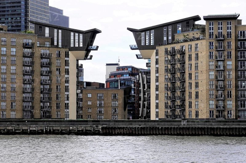 London, England, Great Britain, Europe, Modern residential buildings with unique roof shapes on the riverside