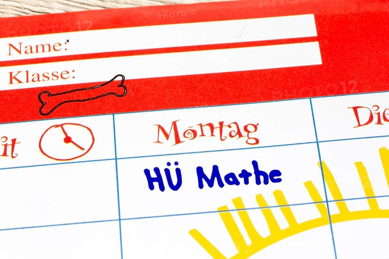 (Photomontage) Close-up of a timetable with added text HÜ MATHE