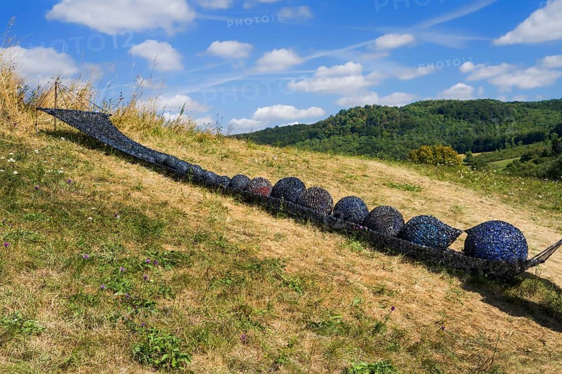 Installation with a hammock, video tape and magnetic tape, HAMACA by Elke Wessel, 12th international wind art festival 2025, landscape exhibition bewegter wind, Zierenberg, Northern Hesse, Germany