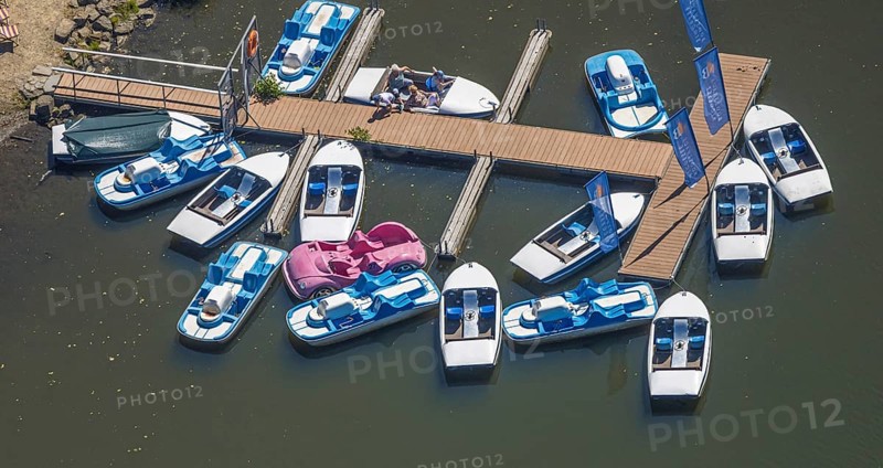 Aerial view, pedal boats at the landing stage at the Biggesee boathouse, people in the boat, shapes and colours, Olpe town, Olpe, Sauerland, North Rhine-Westphalia, Germany