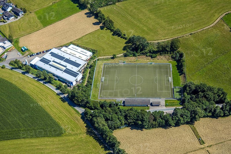 Aerial view, football stadium Vogelwiese Iseringhausen SPVG Iseringhausen, industrial estate Lange GmbH metal processing in precision metal goods manufacturer, Iseringhausen, Drolshagen, Sauerland, North Rhine-Westphalia, Germany