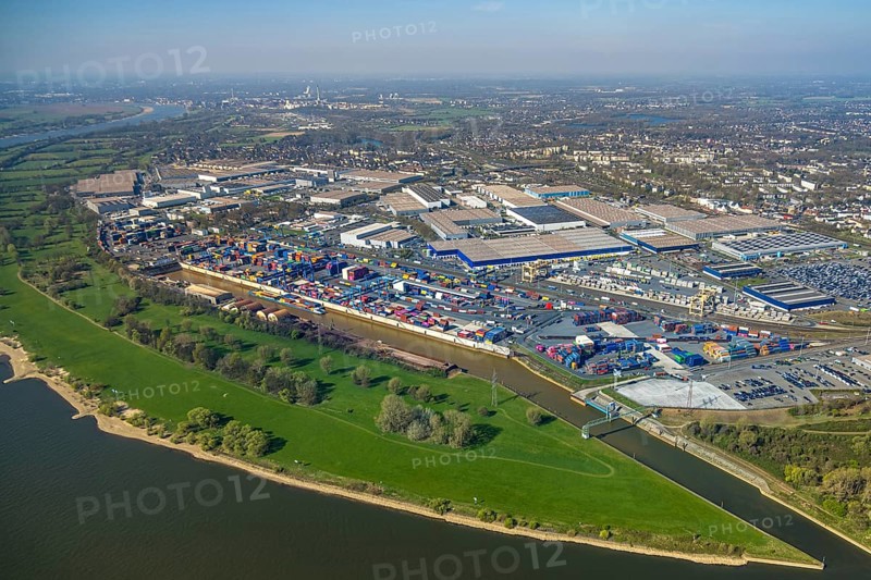 Aerial view, duisport harbour, logport I Rheinhausen, logport 1, container port, Duisburg harbour D3T Duisburg Trimodal Terminal, automobile logistics, river Rhine and distant view, Friemersheim, Duisburg, Ruhr area, North Rhine-Westphalia, Germany