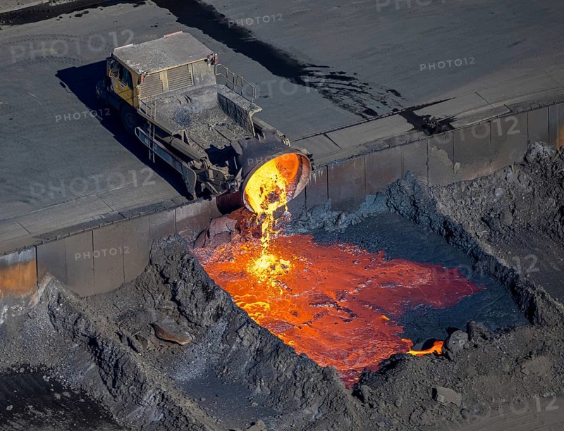 Aerial view, ArcelorMittal Hochfeld GmbH steel wire plant, dumping of red-hot material, Laar, Duisburg, Ruhr area, North Rhine-Westphalia, Germany