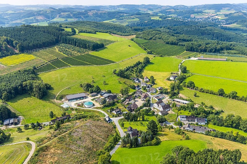 Aerial view, residential area local view district Büemke with chapel St. Agatha, meadows and fields and wooded hilly landscape, Christmas tree cultivation, Reiste, Eslohe, Sauerland, North Rhine-Westphalia, Germany, agriculture, place of worship, farm, DE, Europe, religious community, place of worship, holy place, hilly landscape, hilly landscape and distant view, Church, Agriculture, Agricultural fields, Farm, Aerial view, Aerial photography, Aerial photography, Meschede, Religion, Religious site, Ruhr area, Overview, Bird's-eye view, Meadows and fields, Meadow landscape, birds-eyes view, overview