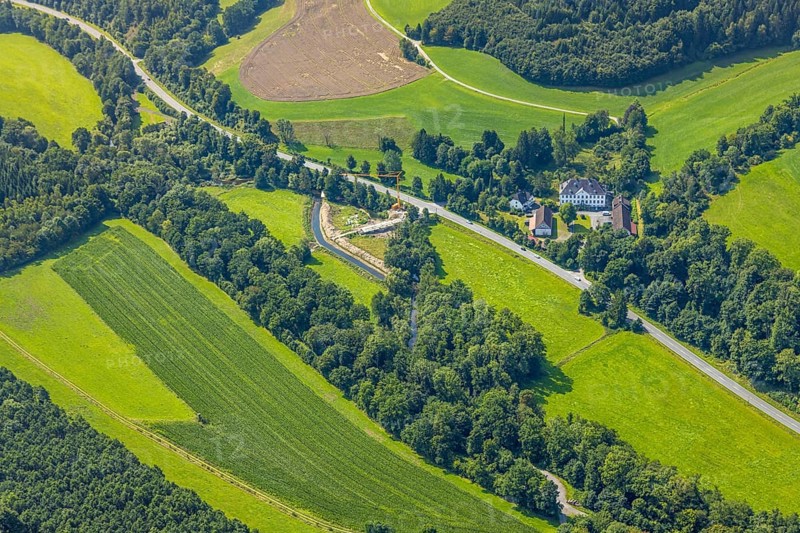 Aerial view, Haus Blessenohl iCastle and castle in the forest, former manor, bridge construction site on the river Wenne, Wenholthausen, Eslohe, Sauerland, North Rhine-Westphalia, Germany, construction work, construction area, building site, building plots, construction project, construction site, bridge, castle, DE, Europe, manor house, manor building, aerial photograph, aerial photography, aerial photography, Meschede, Ruhr area, castle, overview, bird's eye view, birds-eyes view, overview