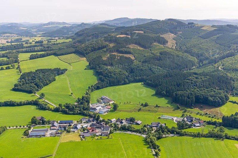 Aerial view, residential area local view district Herhagen surrounded by meadows and fields, forest area with forest damage, Herhagen, Eslohe, Sauerland, North Rhine-Westphalia, Germany, tree mortality, DE, Europe, property tax, hilly landscape, hilly landscape and distant view, real estate, clear cutting, calamity areas, aerial view, aerial photography, aerial photography, Meschede, Ruhr area, overview, bird's-eye view, forest, forest damage, forest dieback, meadows and fields, meadow area, meadow landscape, housing estate, housing and living, residential area, housing quality, residential neighbourhood, housing estate, residential area, birds-eyes view, overview
