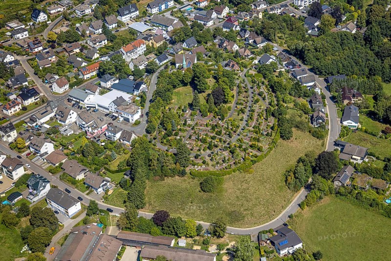 Aerial view, Evangelical church Oberbrügge and evang. Cemetery, residential area on Heerstraße, Oberbrügge, Halver, Sauerland, North Rhine-Westphalia, Germany, place of worship, burial place, DE, Europe, cemetery, memorial, religious community, place of worship, house of God, property tax, graves, burial ground, sacred site, real estate, Kierspe, church, parish, denomination, aerial view, aerial photography, aerial photography, religion, religious site, resting place, Ruhr area, overview, bird's-eye view, residential area, housing and living, residential area, quality of living, residential neighbourhood, housing estate, residential district, birds-eyes view, overview