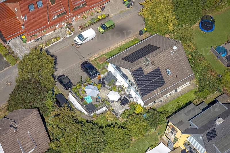 Aerial view, residential building with solar roof on Wiesenstraße, Höferhof, Kierspe, Sauerland, North Rhine-Westphalia, Germany, DE, roof with solar panels, Europe, property tax, real estate, aerial view, aerial photography, aerial photography, photovoltaic system, Ruhr area, solar, solar system, solar roof, solar energy, solar panels, solar power system, overview, bird's eye view, residential complex, living and life, residential area, residential quality, residential neighbourhood, housing estate, residential area, birds-eyes view, overview