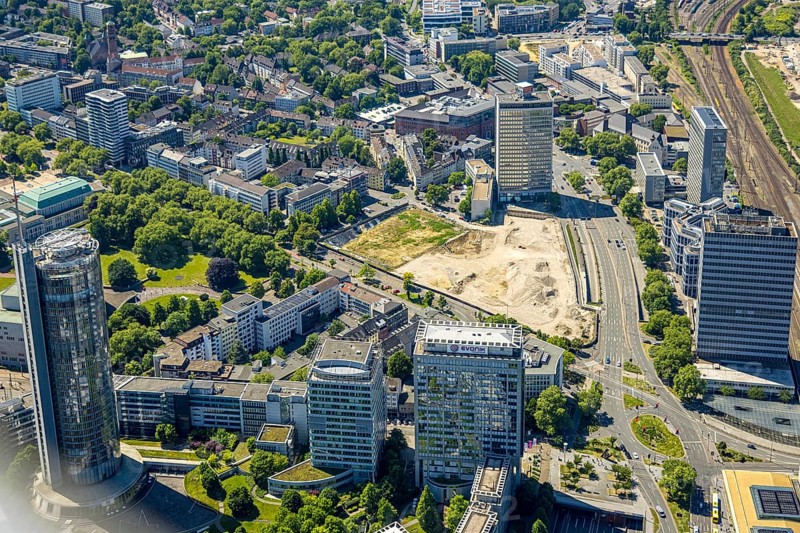Aerial view, Campus Essen. Construction site, Kölbl Kruse construction site near Freiheit, left Westenergie tower, Innogy high-rise, right Fakt Tower thyssenkrupp, DB Schenker, Postbank high-rise, Südviertel, Essen, Ruhr area, North Rhine-Westphalia, Germany