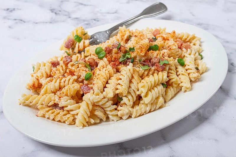 Fusilli pasta with cheese and bacon, homemade, no people