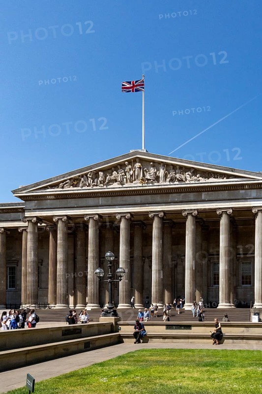 London, United Kingdom - 14 May 2025: Tourists gathering on the steps of the famous British Museum in London