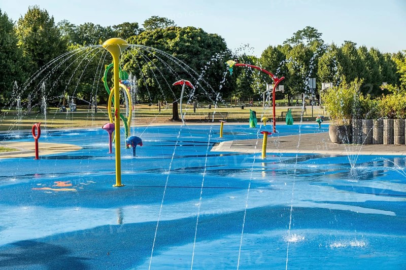 Water playground with colourful fountains at a glance, green belt, Cologne, North Rhine-Westphalia