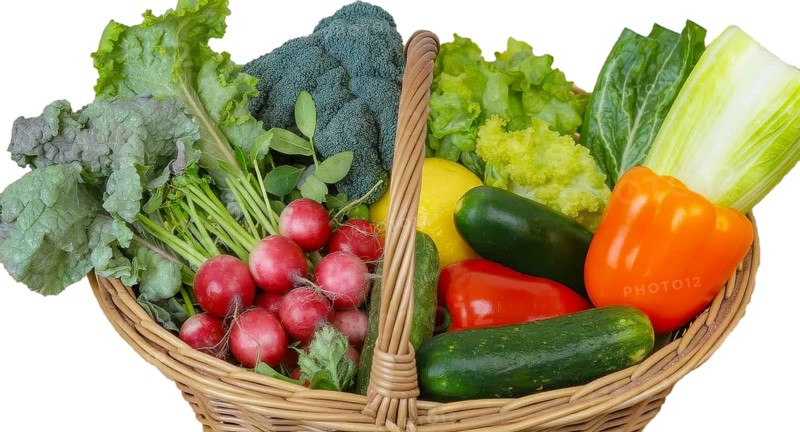 A wicker basket overflowing with a colorful array of fresh vegetables, including radishes, lettuce, cucumbers, and bell peppers, AI generated