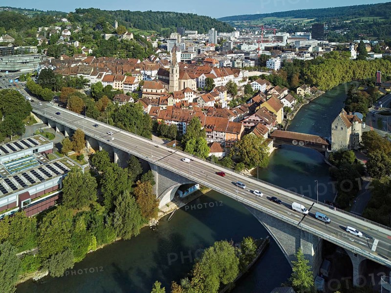 View of the old town, in front the high bridge, behind the covered wooden bridge with the Landvogteischloss on the river Limmat, Baden, Canton, Aargau, Switzerland