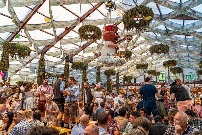 Visitors in the Hofbräu marquee at the Oktoberfest 2024 in Munich, Bavaria, Germany