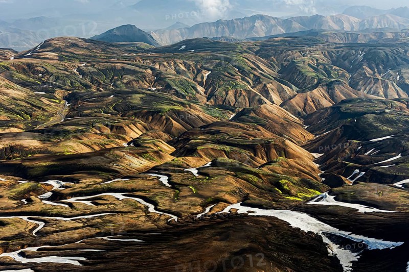 Mountain landscape, sunny, summer, snowfields, volcanic landscape, aerial view, Landmannalaugar, Fjallabak Nature Reserve, Icelandic Highlands, Iceland