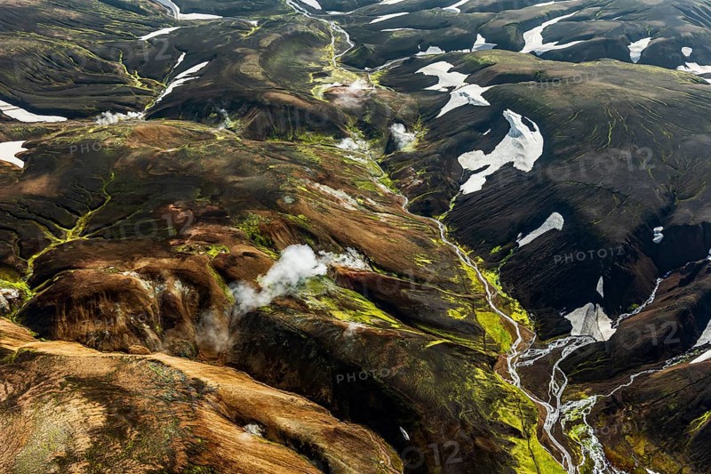 Mountain landscape, sunny, summer, hot springs, snowfields, volcanic landscape, aerial view, Landmannalaugar, Fjallabak Nature Reserve, Icelandic Highlands, Iceland