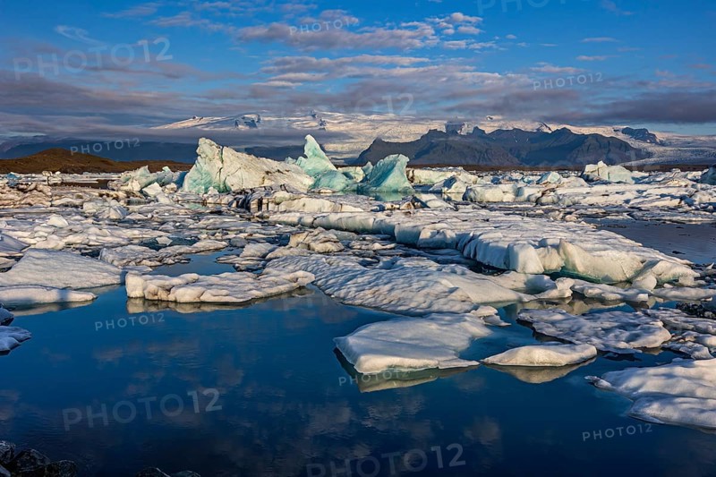 Icebergs, ice floes, lake, glacier lagoon, glacier, mountains, clouds, summer, morning mood, reflection, Jökulsarlon, Vatnajökull National Park, Iceland