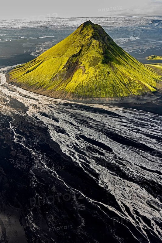 Mountain landscape, sunny, summer, volcanic landscape, river bed, river, aerial view, backlight, Maelifell volcano, Maelifellssandur, behind it Myrdalsjökull glacier, Icelandic Highlands, Iceland