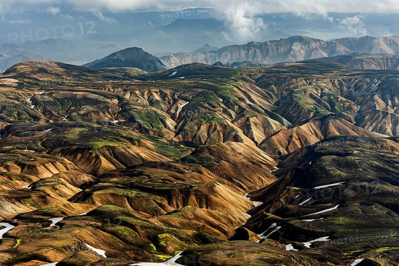 Mountain landscape, sunny, summer, snowfields, volcanic landscape, aerial view, Landmannalaugar, Fjallabak Nature Reserve, Icelandic Highlands, Iceland