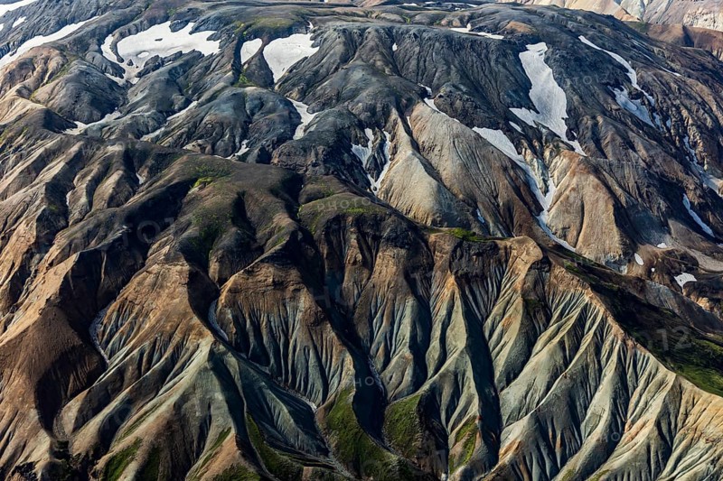Mountain landscape, sunny, summer, snowfields, volcanic landscape, aerial view, Landmannalaugar, Fjallabak Nature Reserve, Icelandic Highlands, Iceland