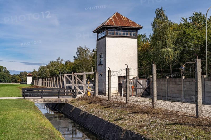 Camp fence and watchtower, Dachau Concentration Camp Memorial, Bavaria, Germany