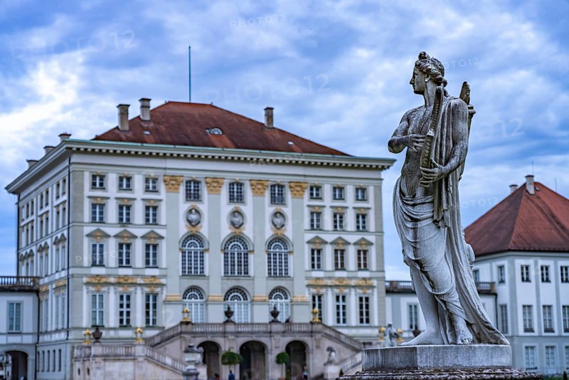 Statue of Apollo with kithara in the park of Nymphenburg Palace in Munich, Bavaria, Germany