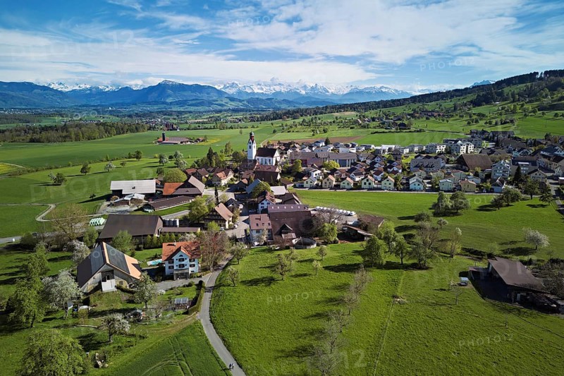 View of the village, behind the Rigi and the snow-covered Alps, Beinwil, Freiamt, Canton, Aargau, Switzerland