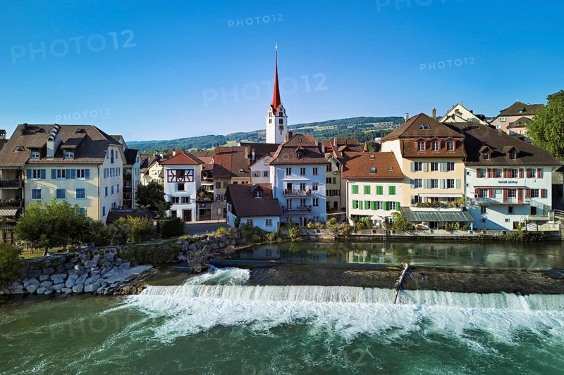 Old town with the Catholic Church of St Nicholas, in the foreground the weir on the river Reuss, Bremgarten, Freiamt, Canton, Aargau, Switzerland