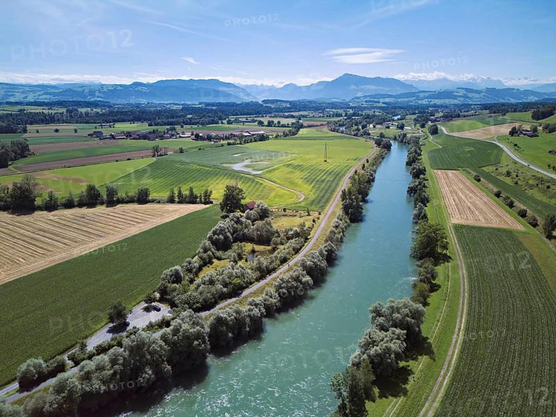 Cultural landscape to the left and right of the river Reuss, behind the Rigi, Mühlau, Freiamt, Canton, Aargau, Switzerland