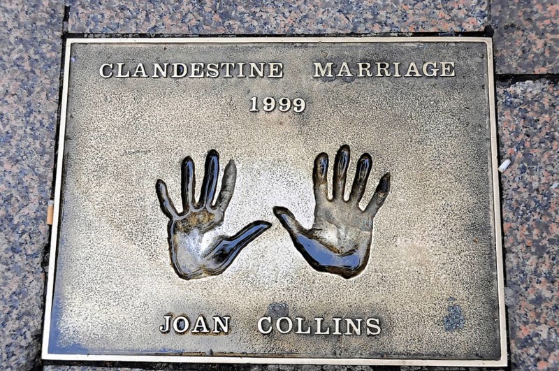 Metal plate with handprints and the inscription of Joan Collins, Clandestine Marriage 1999, London, England, Great Britain