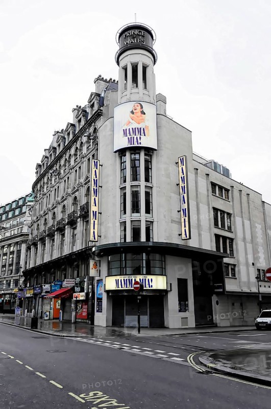 London, England, Great Britain, Europe, A building with a large Mamma Mia poster standing on an empty street