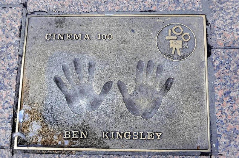 Ben Kingsley's handprints for Cinema 100 on a metal plate in the pavement, London, England, Great Britain