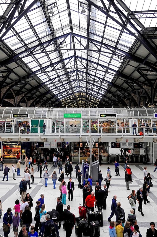 Interior view of Liverpool Street station, London, England, Great Britain, Crowd in the station under a large glass roof, London, England, Great Britain
