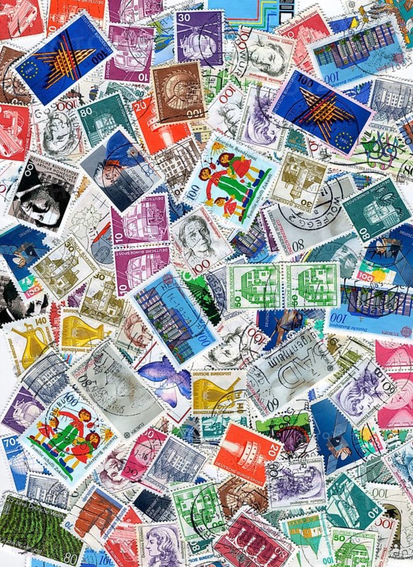 Background with lots of old german postage stamps