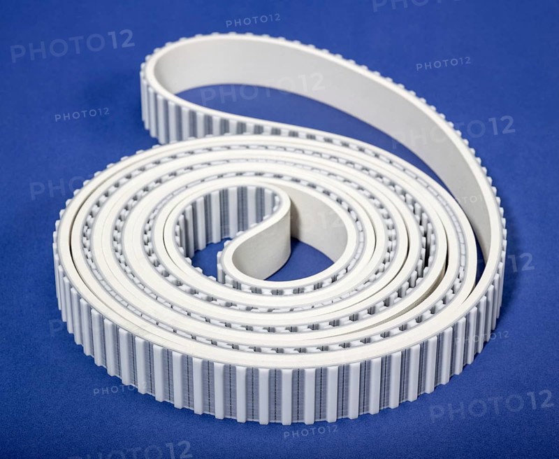A white rolled drive belt in blue back