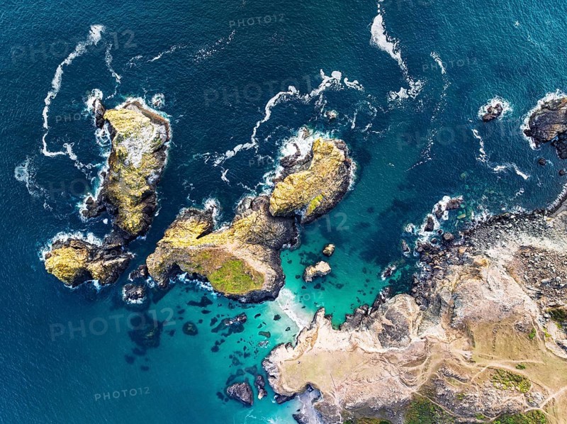 Top Down view over Kynance Cove from a drone, Mount's Bay, Lizard Point, Cornwall, England, United Kingdom