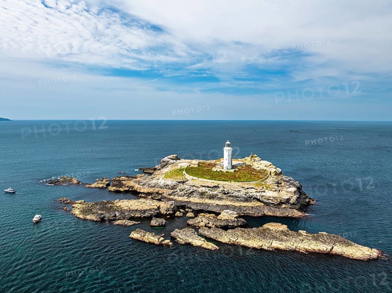 Godrevy Lighthouse from a drone, Godrevy Island, St Ives Bay, Cornwall, England, United Kingdom