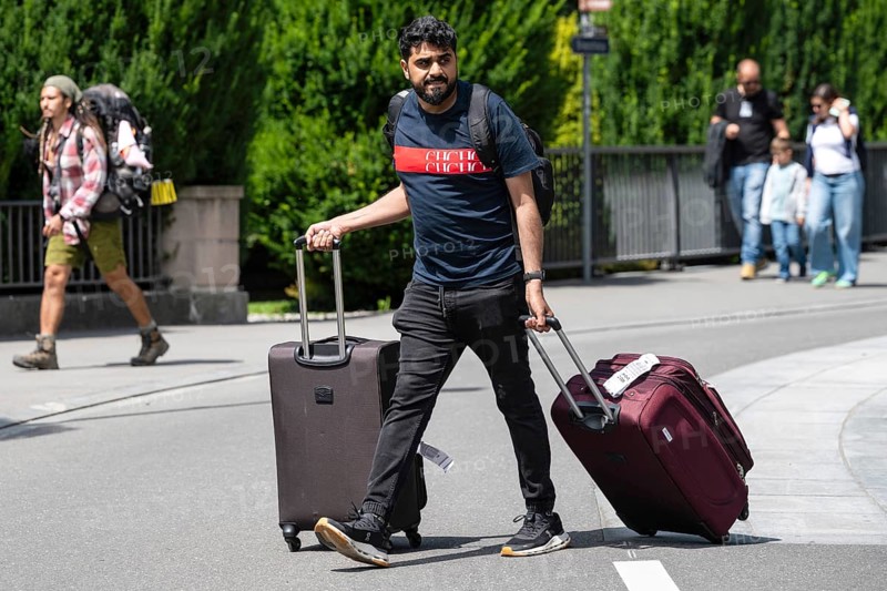 Tourist with suitcase, Interlaken, Switzerland
