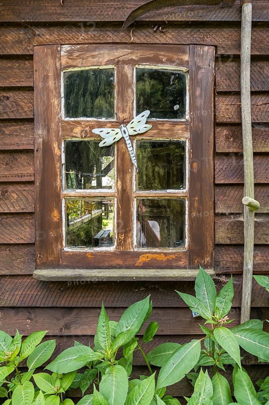 Window with decoration, wooden window, historic, wooden house, Bissendorf, Lower Saxony, Germany