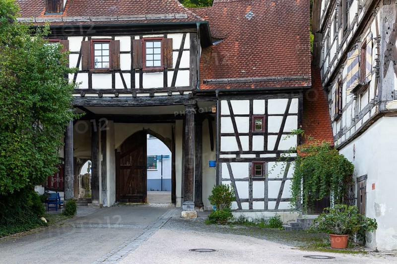 Monastery complex, archway, half-timbered house, Blaubeuren, Swabian Alb, Baden-Württemberg, Germany